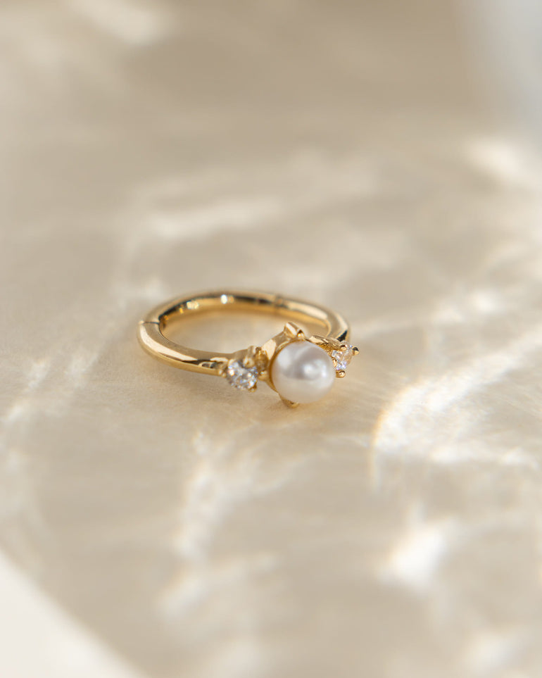 Perlen Clicker Ring liegend