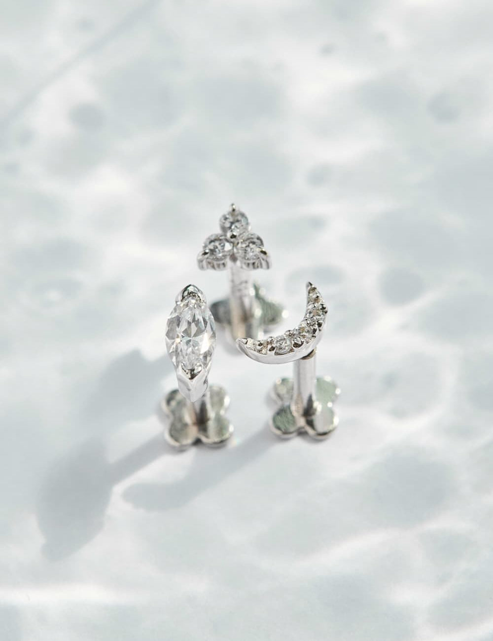 White gold stud earrings standing