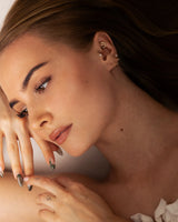 Trinity Piercing getragen im Tragus